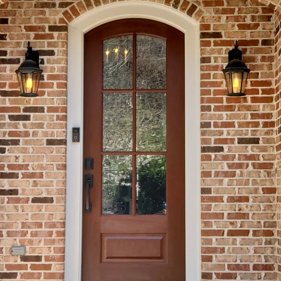 Brick house with fiberglass front door with privacy glass