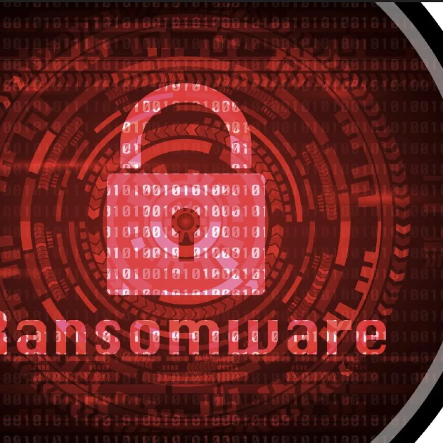 Red digital lock icon with binary code and the word ransomware symbolizing cyberattack security threat.