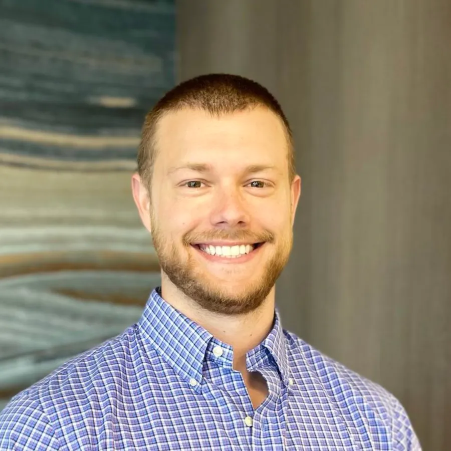 a man smiling for the camera