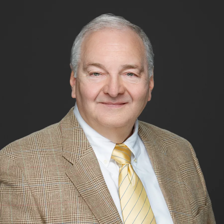 a man in a suit and tie