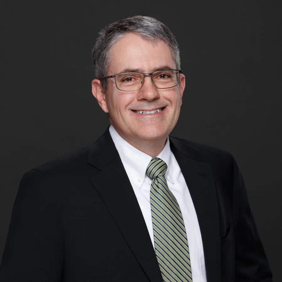 a man wearing a suit and tie