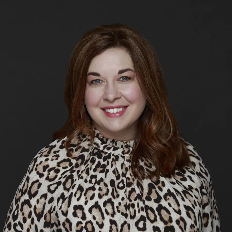 a person smiling for the camera
