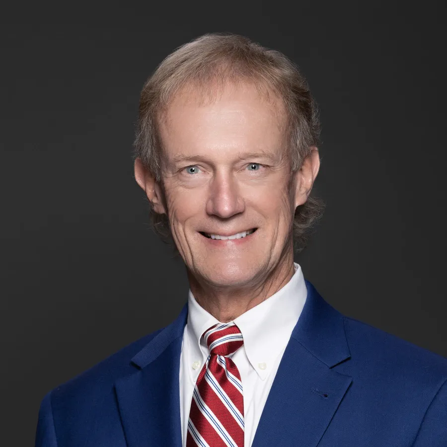 a man in a suit and tie