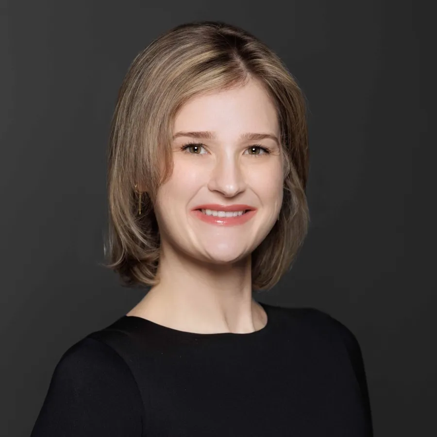 a person smiling for the camera