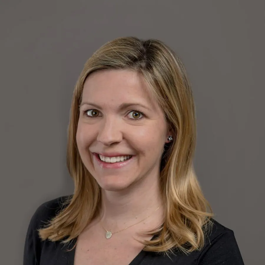 a woman smiling for the camera