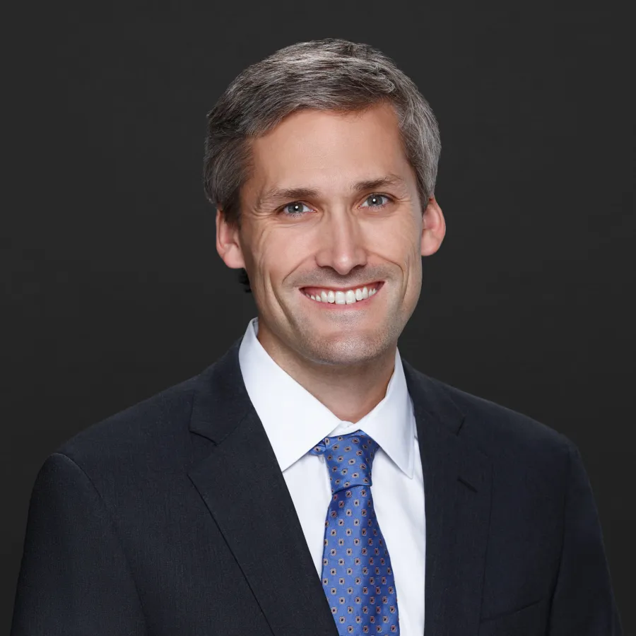 a man in a suit and tie