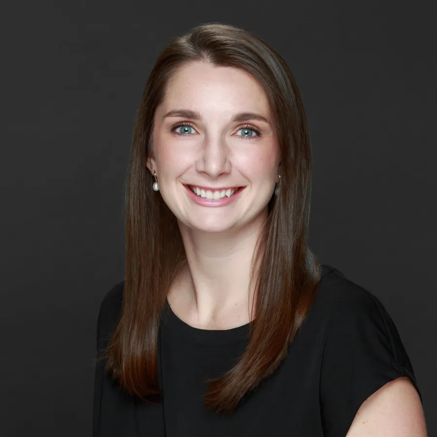 a woman smiling for the camera