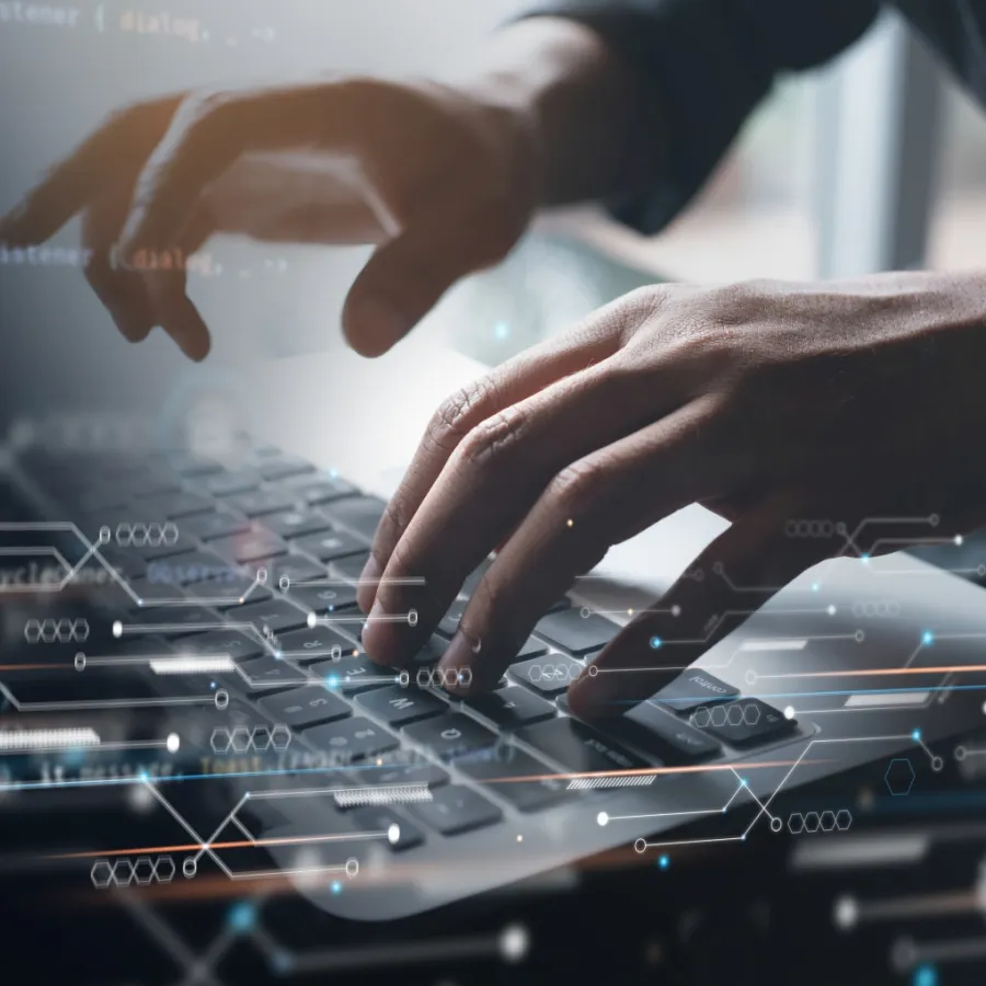 a close-up of hands on a computer