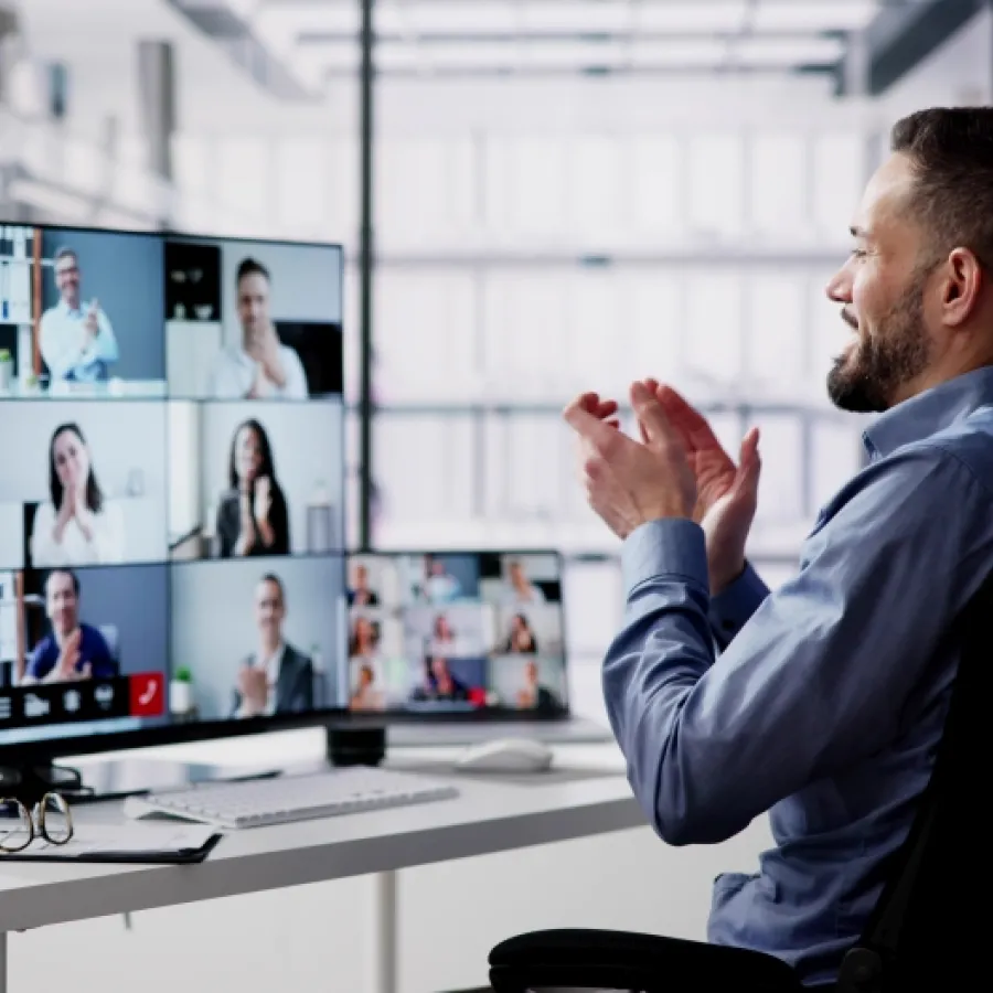 a man pointing at a screen