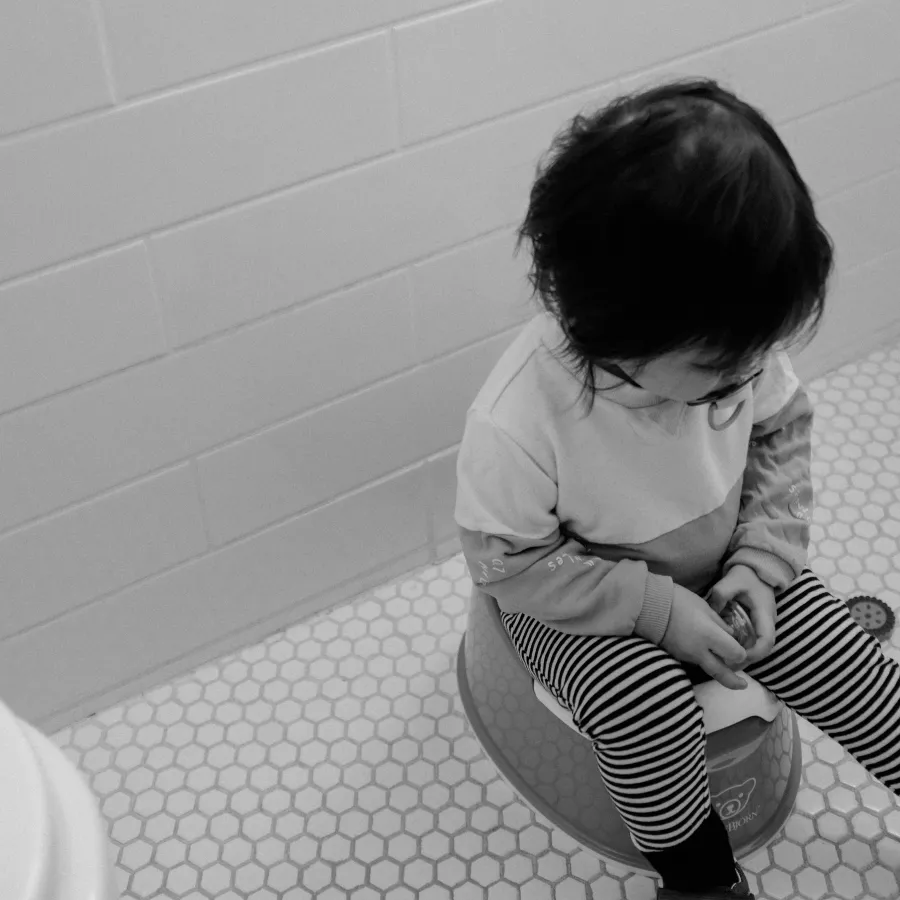 a child sitting on the floor