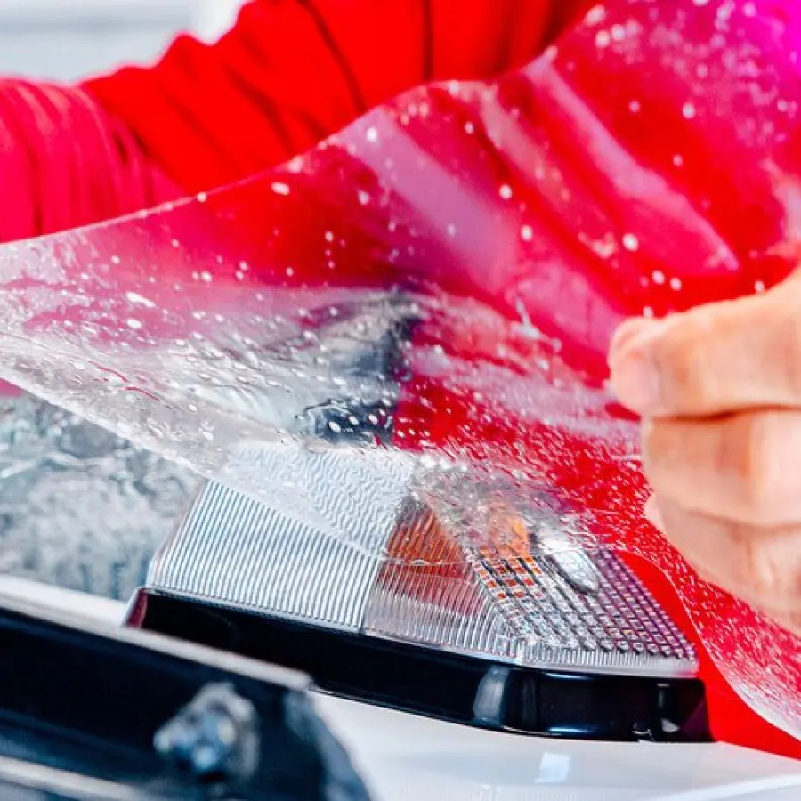 a person washing a car