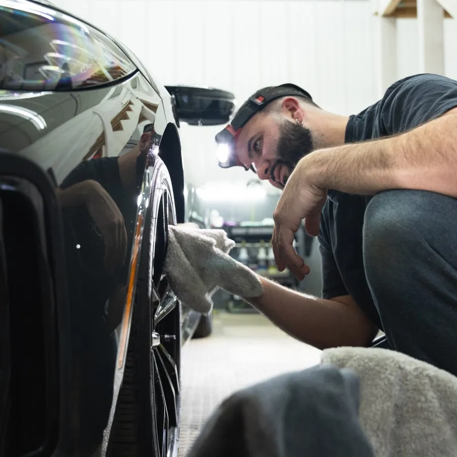 a man working on a car