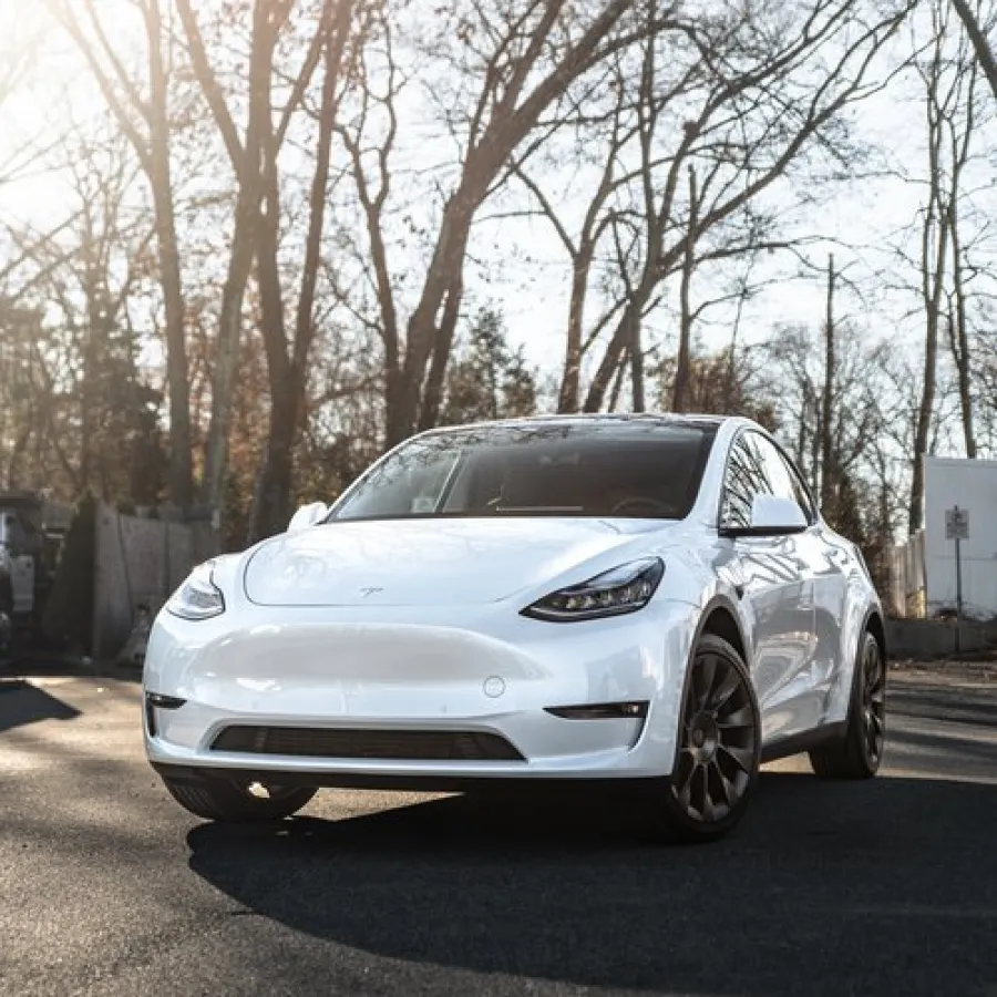 a white car parked on a street