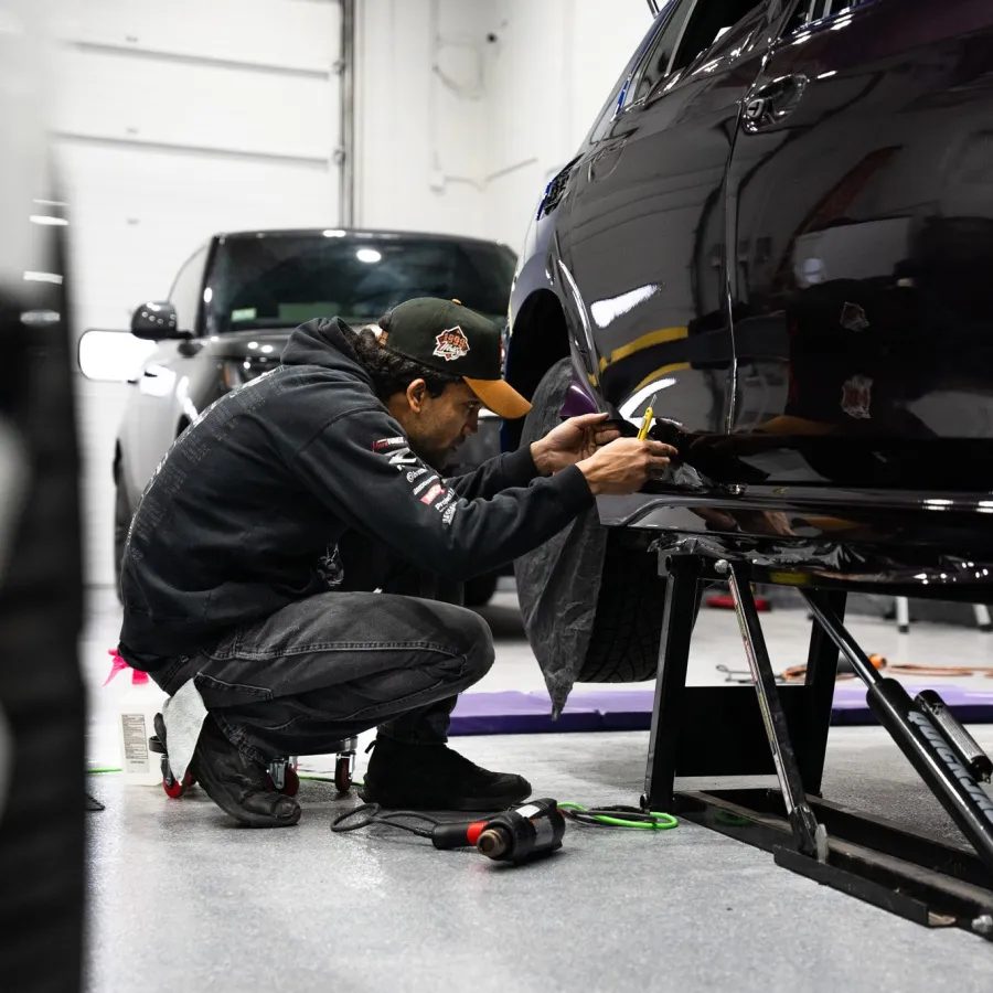 a man working on a car