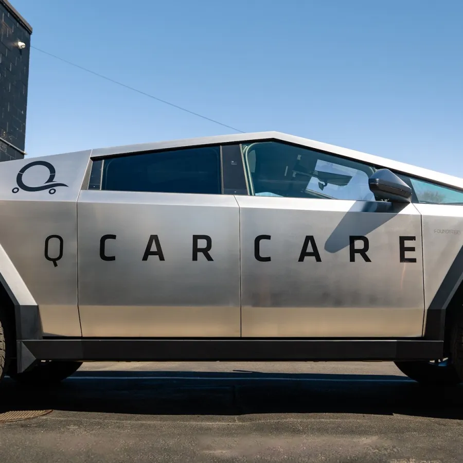 a white car parked outside a building