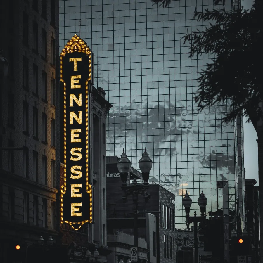 a city street with a large sign