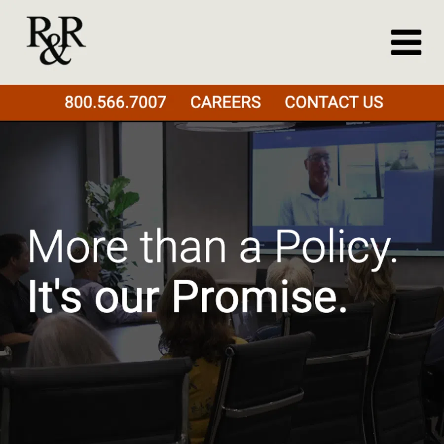 Business team watching virtual meeting on screen with insurance service website overlay and tagline promise.