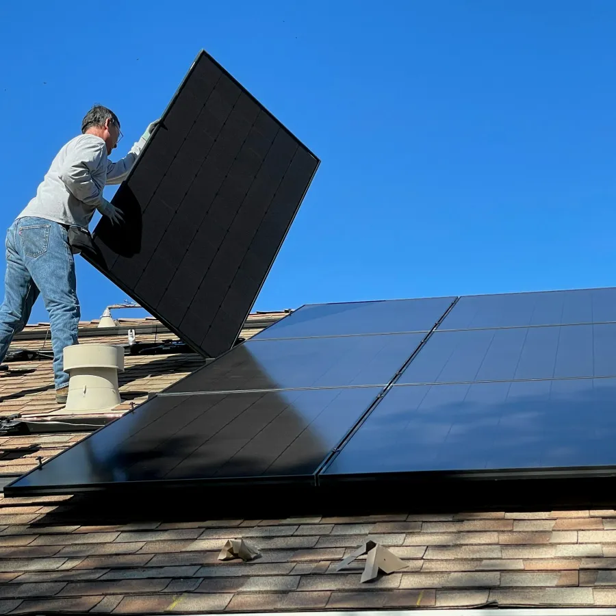 a man standing on a roof