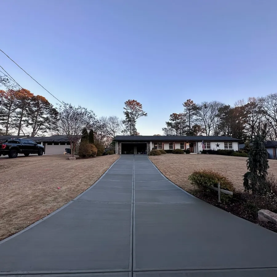 a paved area with a building in the background