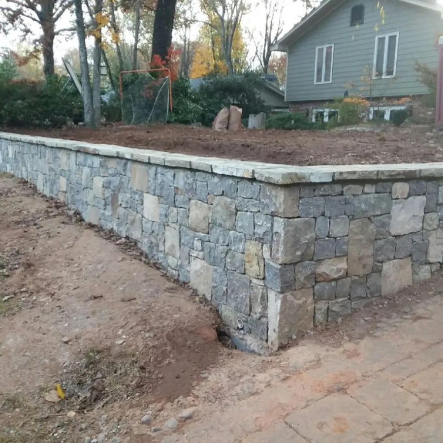 a stone wall with a stone wall