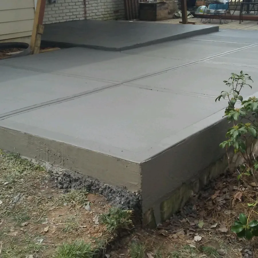 a concrete slab with a planter