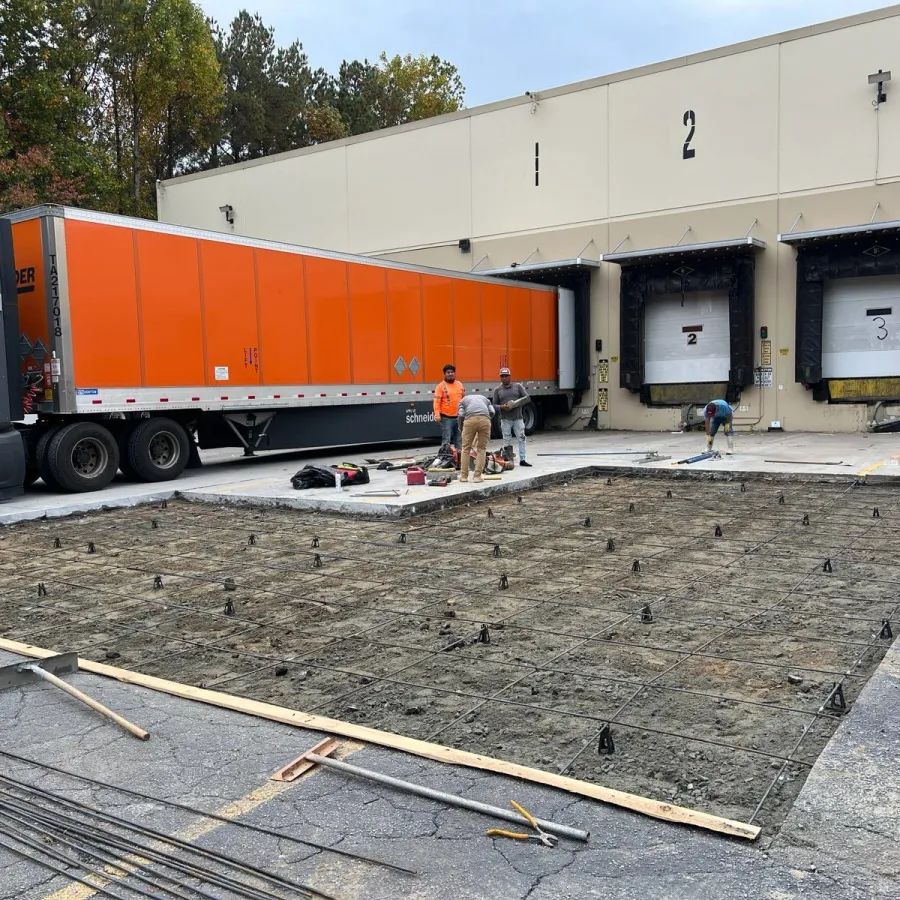 a group of people working on a truck