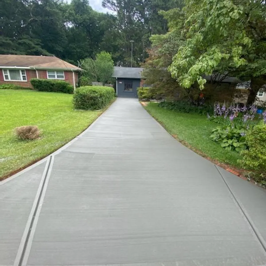 a driveway leading to a house