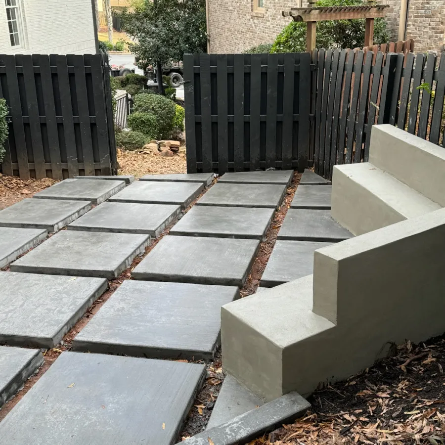 Unique patio allowing green space or small stone infill between sections