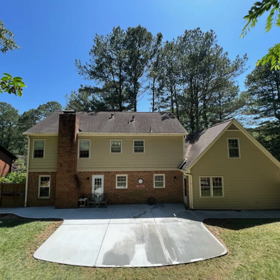 a house with a pool in the front yard