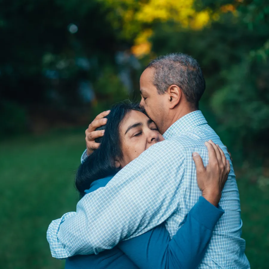 a man and woman hugging