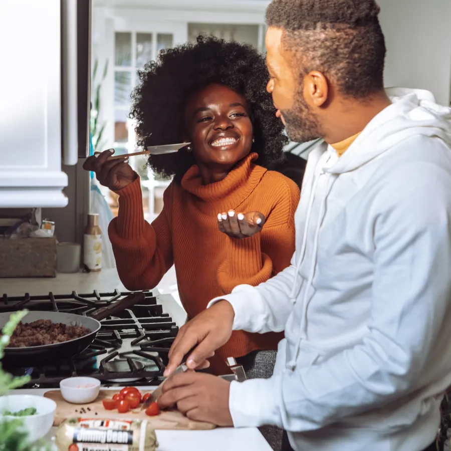 a man and a woman cooking