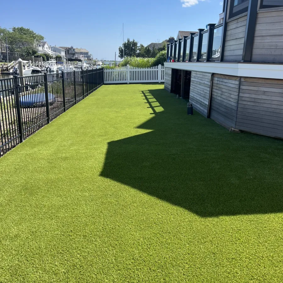 a grassy area next to a building
