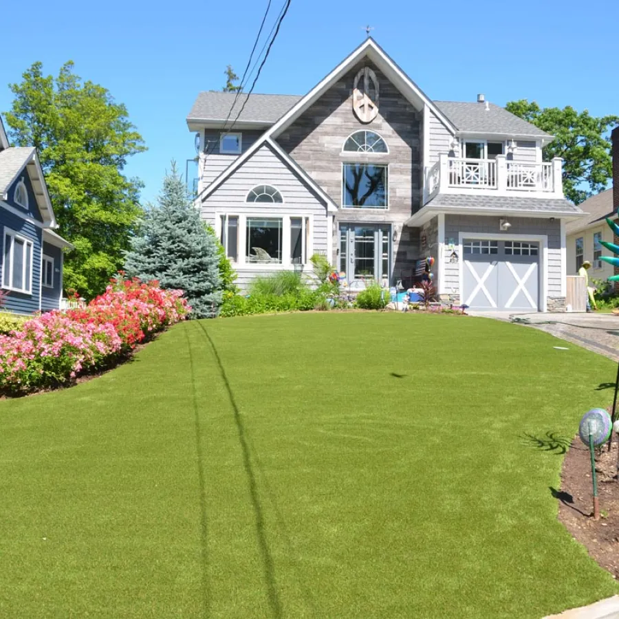 a yard with a house and trees