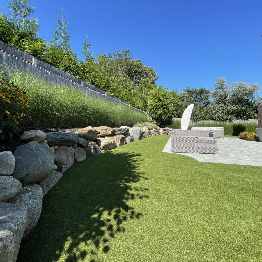 a stone pathway with a fountain