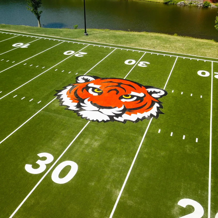 a football field with a logo