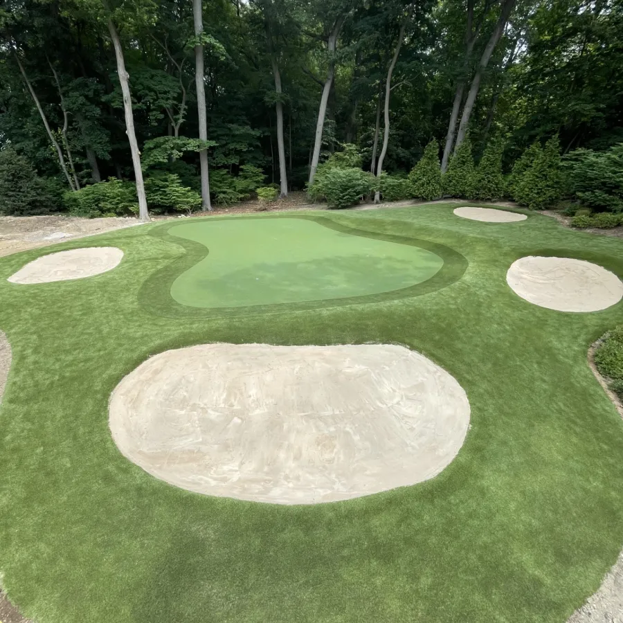 a golf course with trees