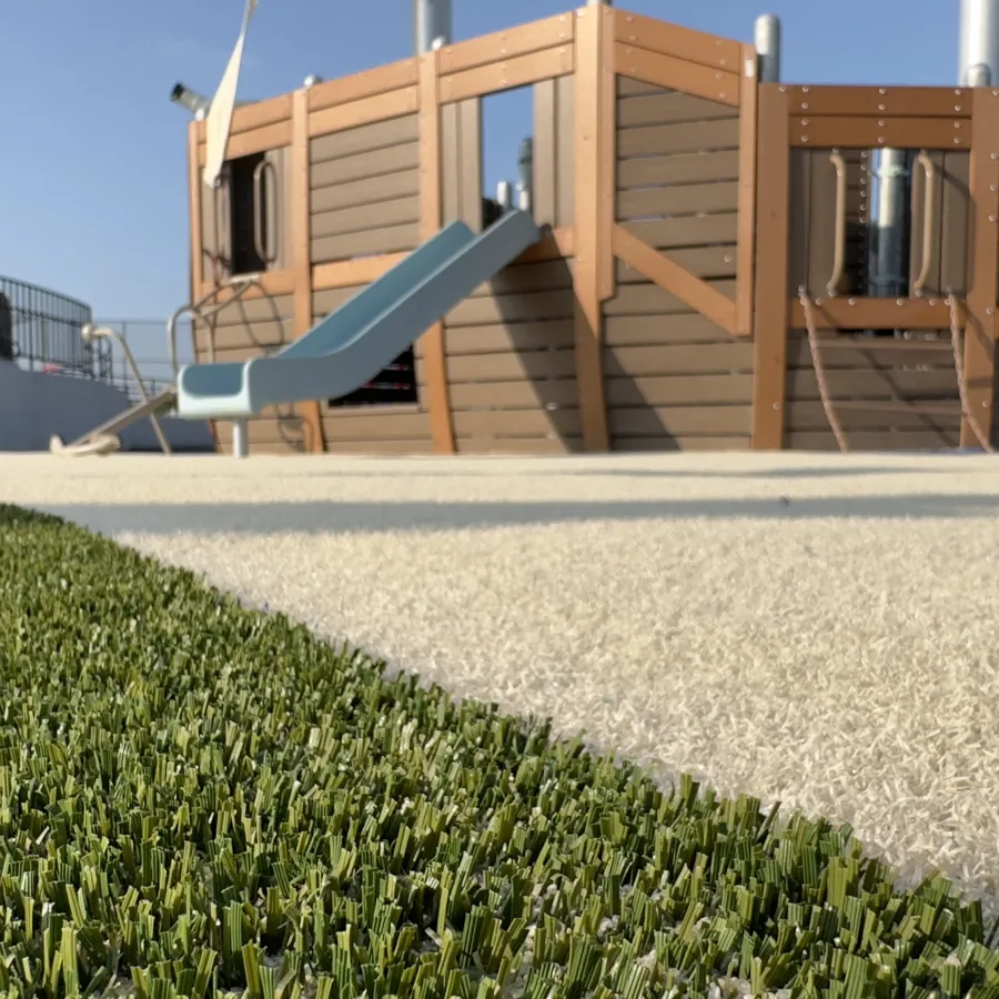 a building with a grass lawn