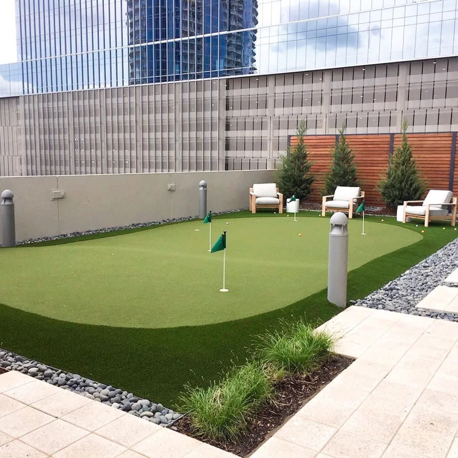 a courtyard with a building in the background