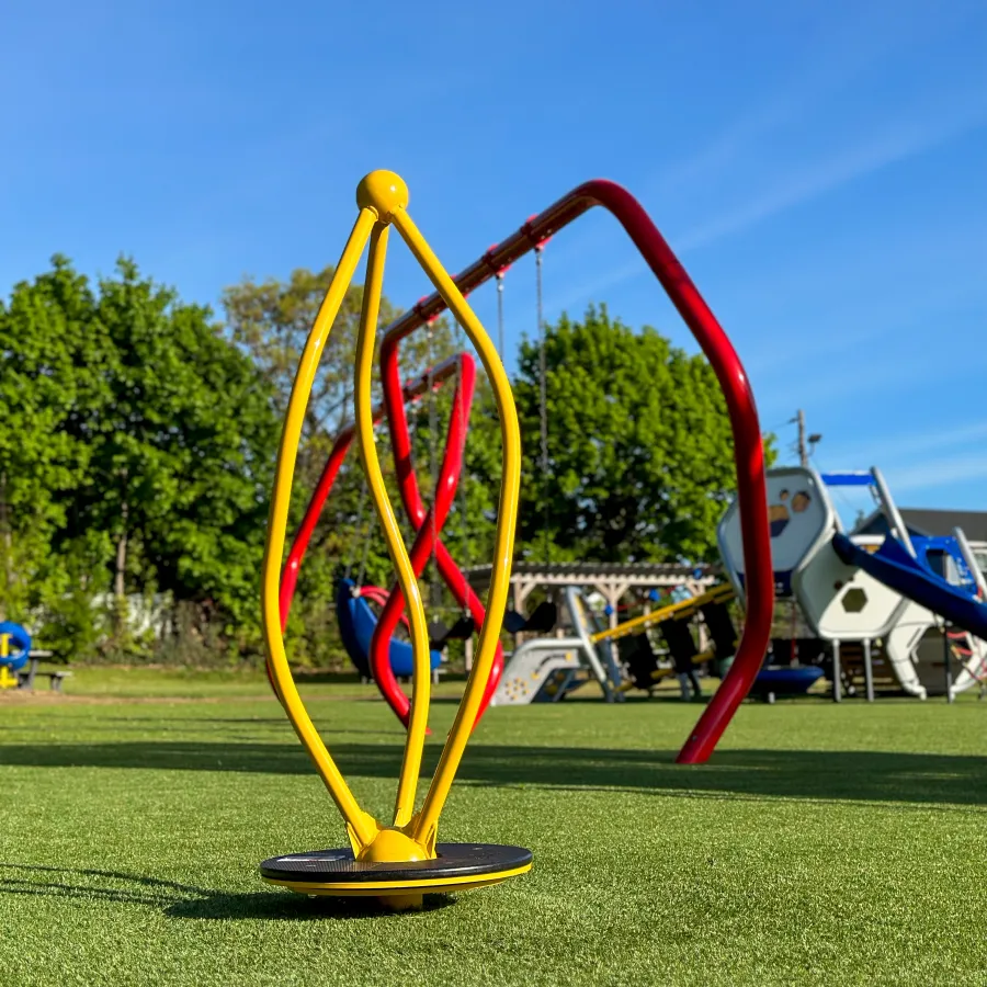 a colorful sculpture in a park