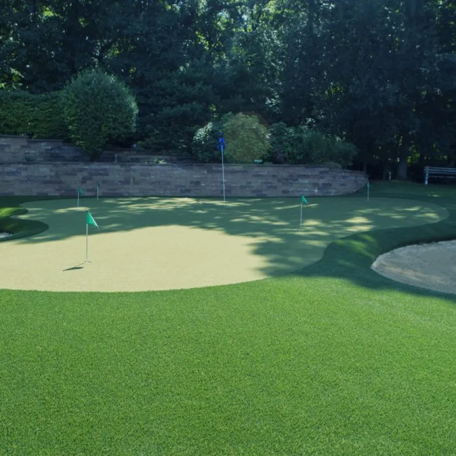 a golf course with a green field