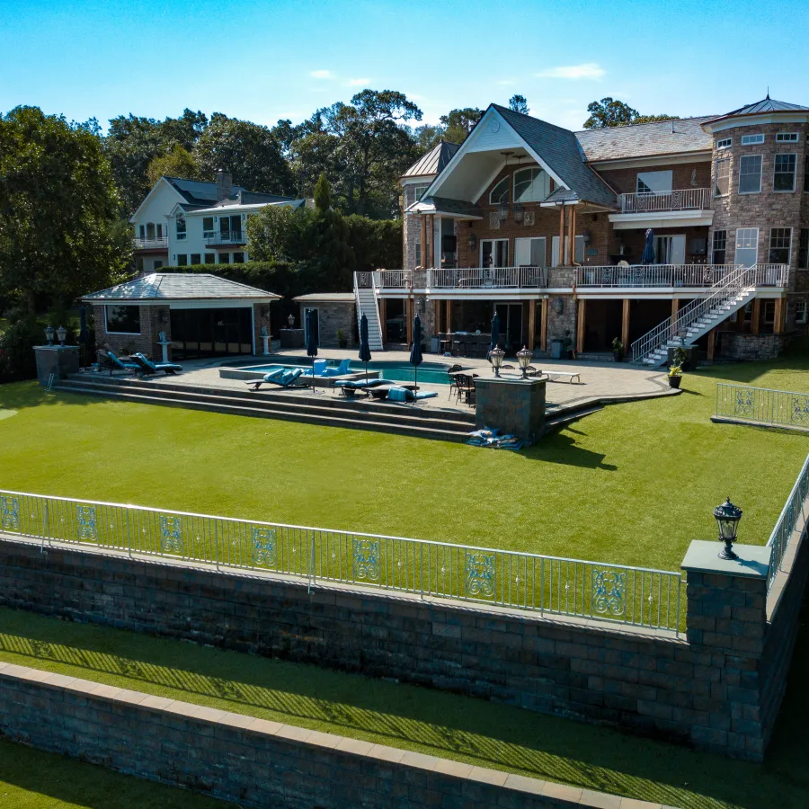 a building with a pool in front