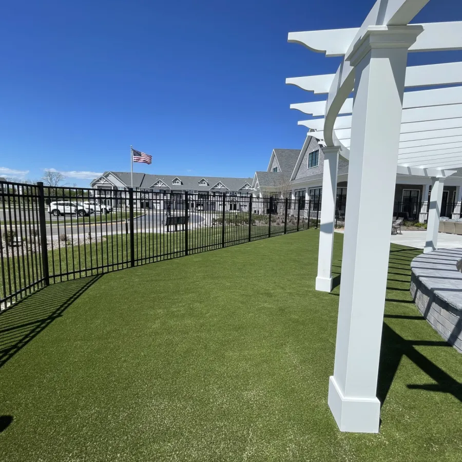 a large white gazebo in a grassy area
