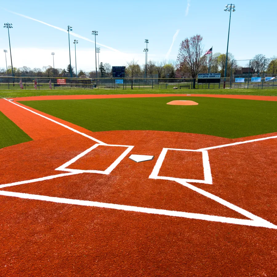 a baseball field with a red and white field