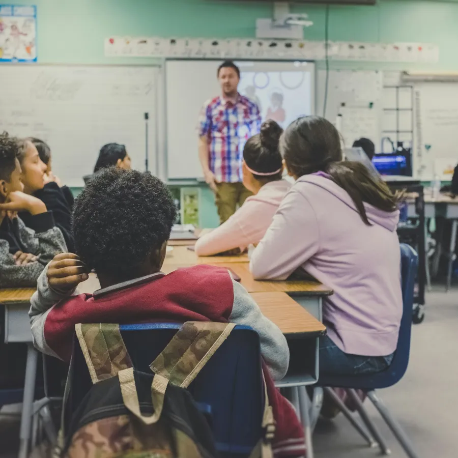 a group of people in a classroom