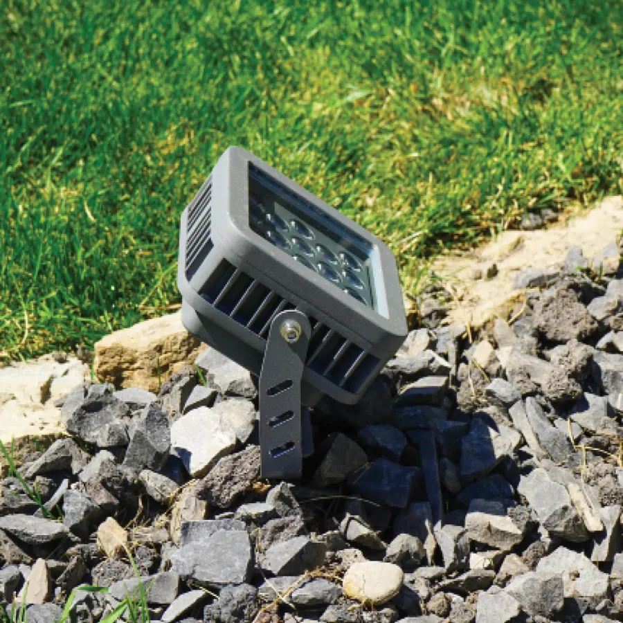 a small television on rocks