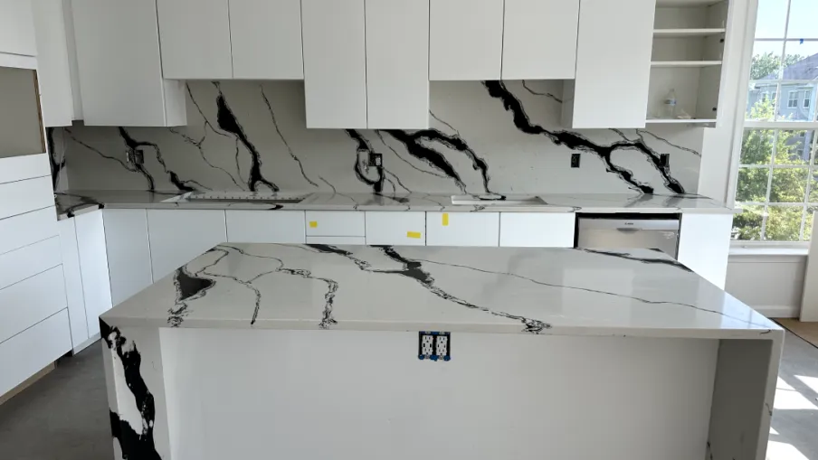 a kitchen with white cabinets