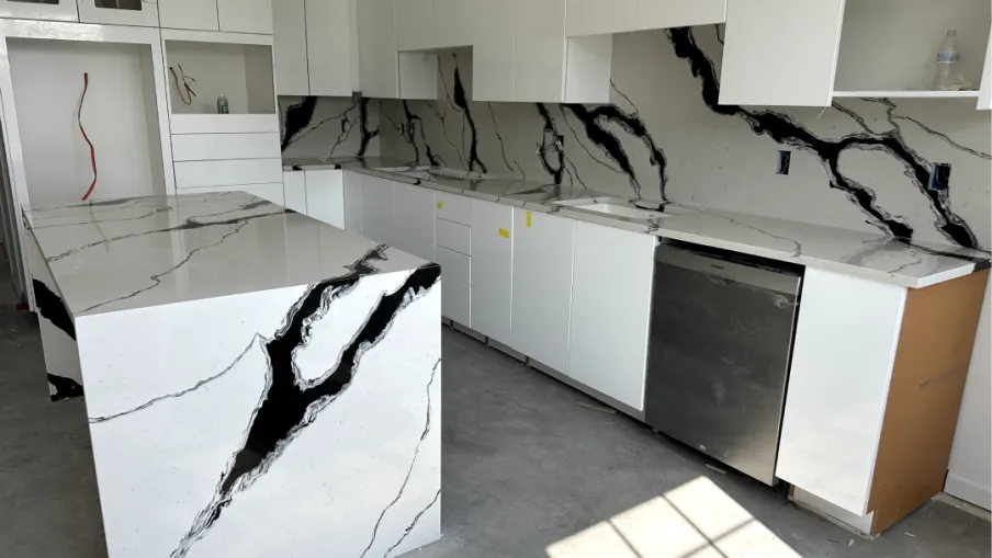 a kitchen with white cabinets