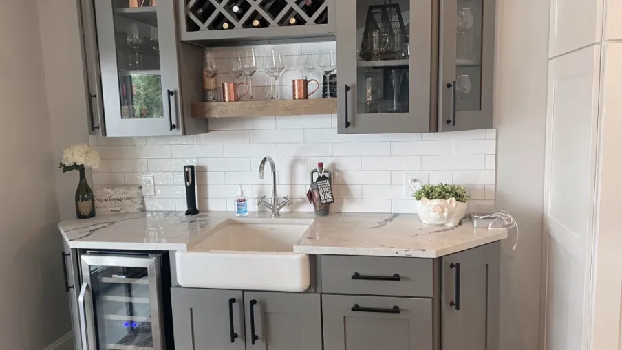 a kitchen with white cabinets