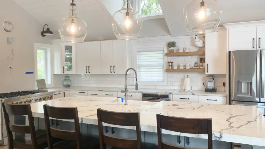 a kitchen with a table and chairs