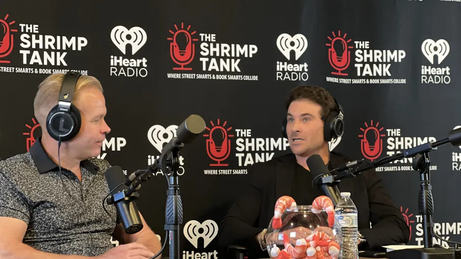 a couple of men wearing headphones